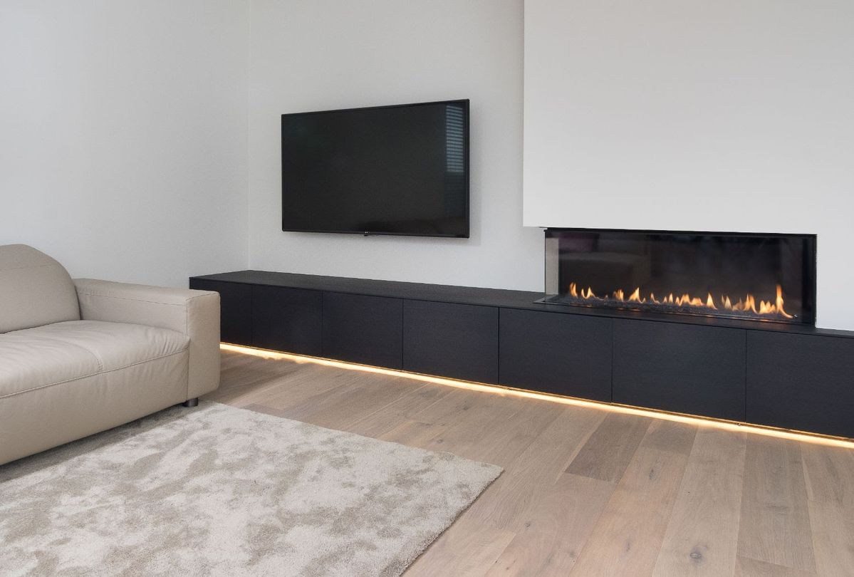 Woonkamer-Vloer-Interieur-Renovatie-Aannemer-Rotterdam Woonkamer interieur inclusief vloer en haard door Aannemer Rotterdam